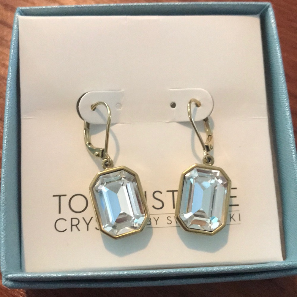 Golden emerald cut earrings